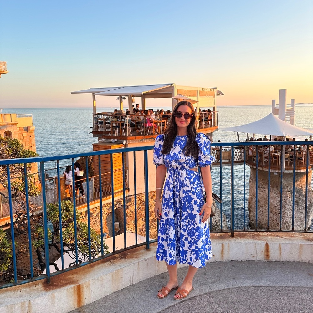 Blue floral midi dress with open back and tie